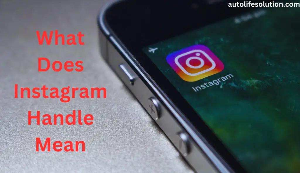 A close-up image of a smartphone screen displaying the Instagram app logo with the text 'What Is an Instagram Handle?' written on the screen